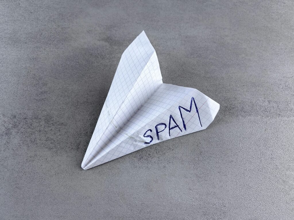 A paper aeroplane with the word SPAM written on it in big letters, to celebrate the release of the Circuspam Free Spam Toolkit.