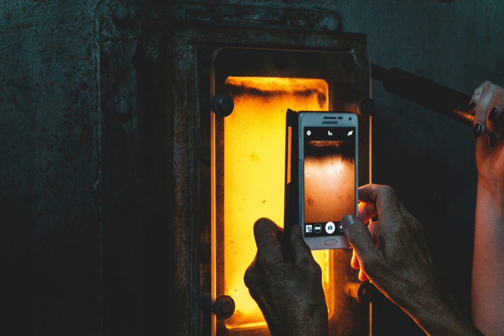 Someone photographing a hot thing, rather than acting, which is what we tend to do nowadays.